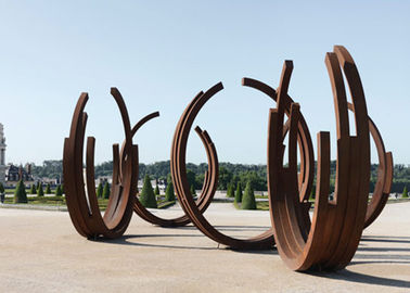 คุณภาพ การเต้นของริบบิ้น Corten ลักษณะประติมากรรมเหล็กสำหรับตกแต่งกลางแจ้ง โรงงาน